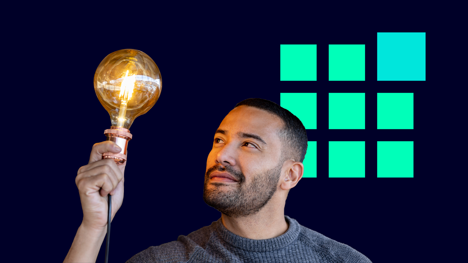 Man holding lit lightbulb up with 3x3 square patterned icon in background